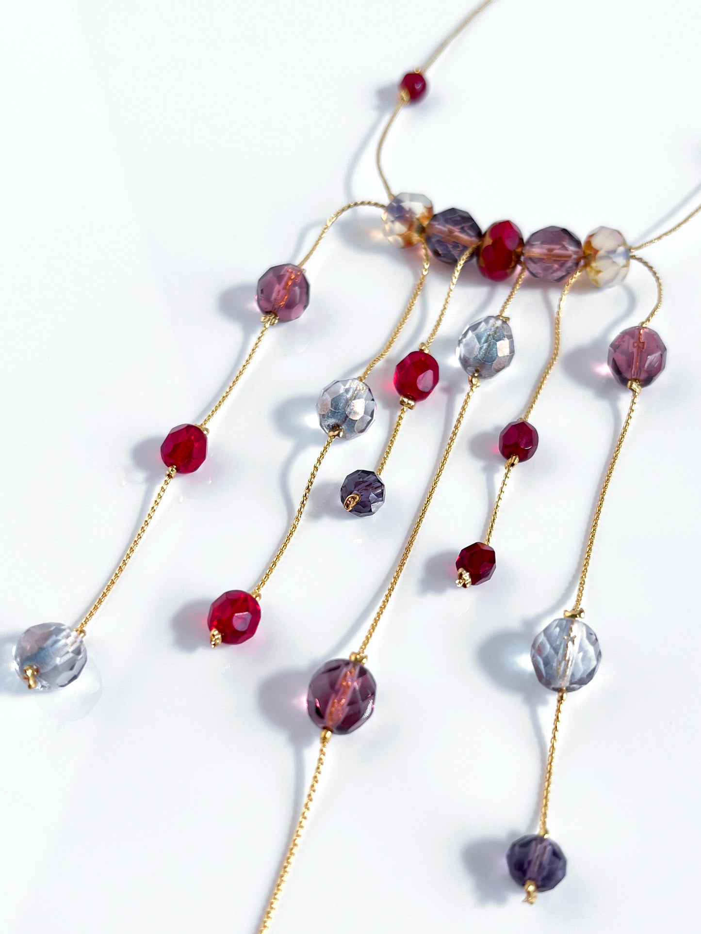 5-strand necklace of mauve and garnet crystals - Collection - MEMORIES -