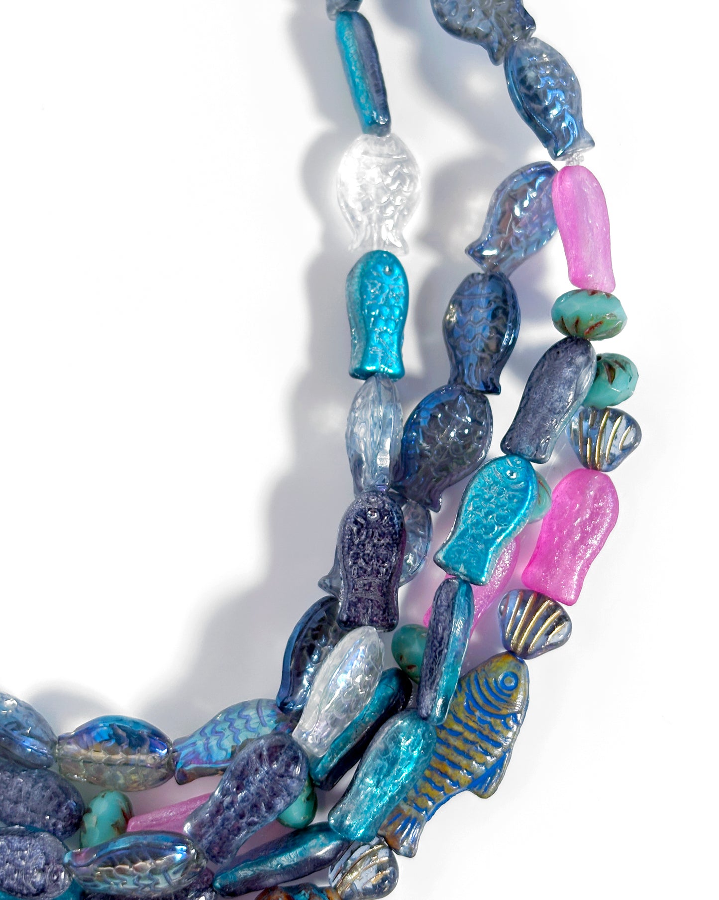 Marea necklace with blue and fuchsia boho fish crystals