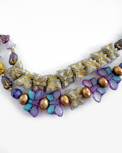 Collar-choker doble boho con mariposas doradas y azuladas