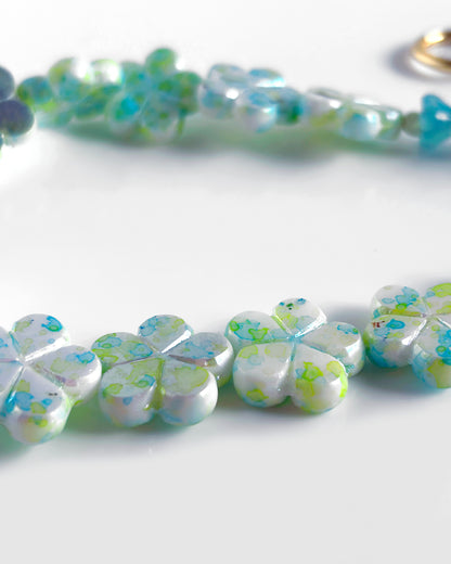 Collar-choker floral turquesa y verde agua efecto espejo
