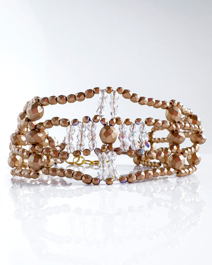 Transparent and gold cross choker