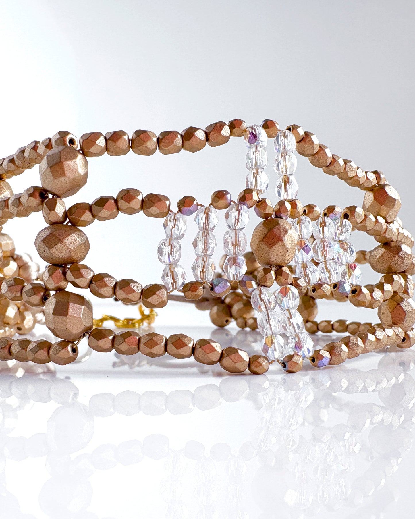 Transparent and gold cross choker