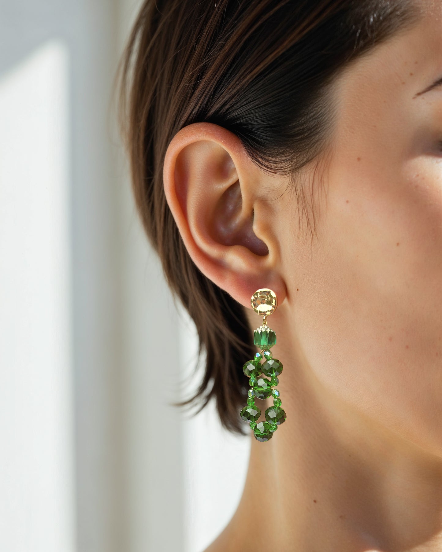 CALA earrings with green crystals