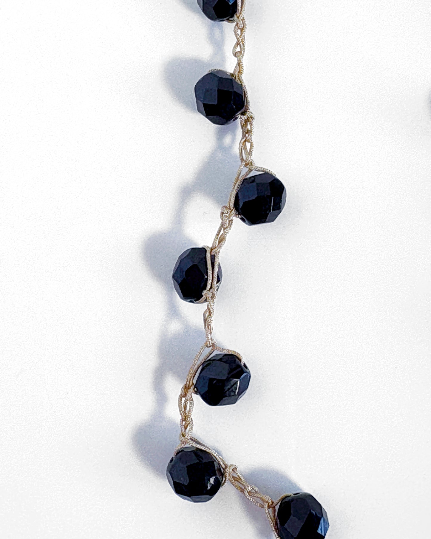Short crochet necklace with shiny black crystals