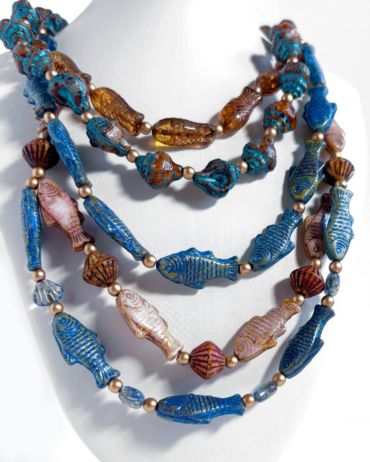 Boho Waterfall Necklace with Blue and Brown Fish and Cowrie Shells