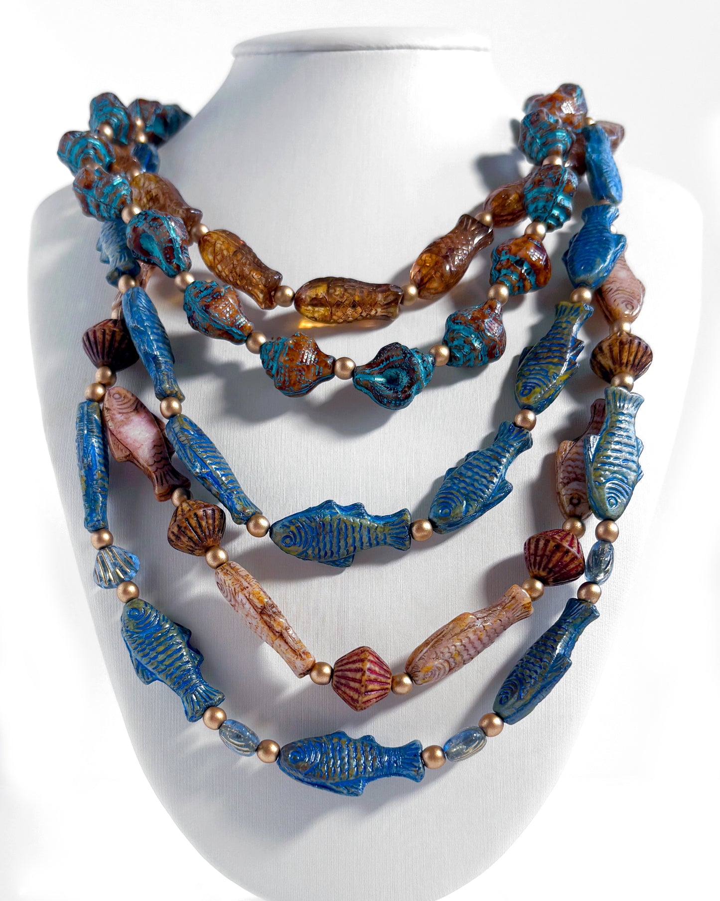 Boho Waterfall Necklace with Blue and Brown Fish and Cowrie Shells