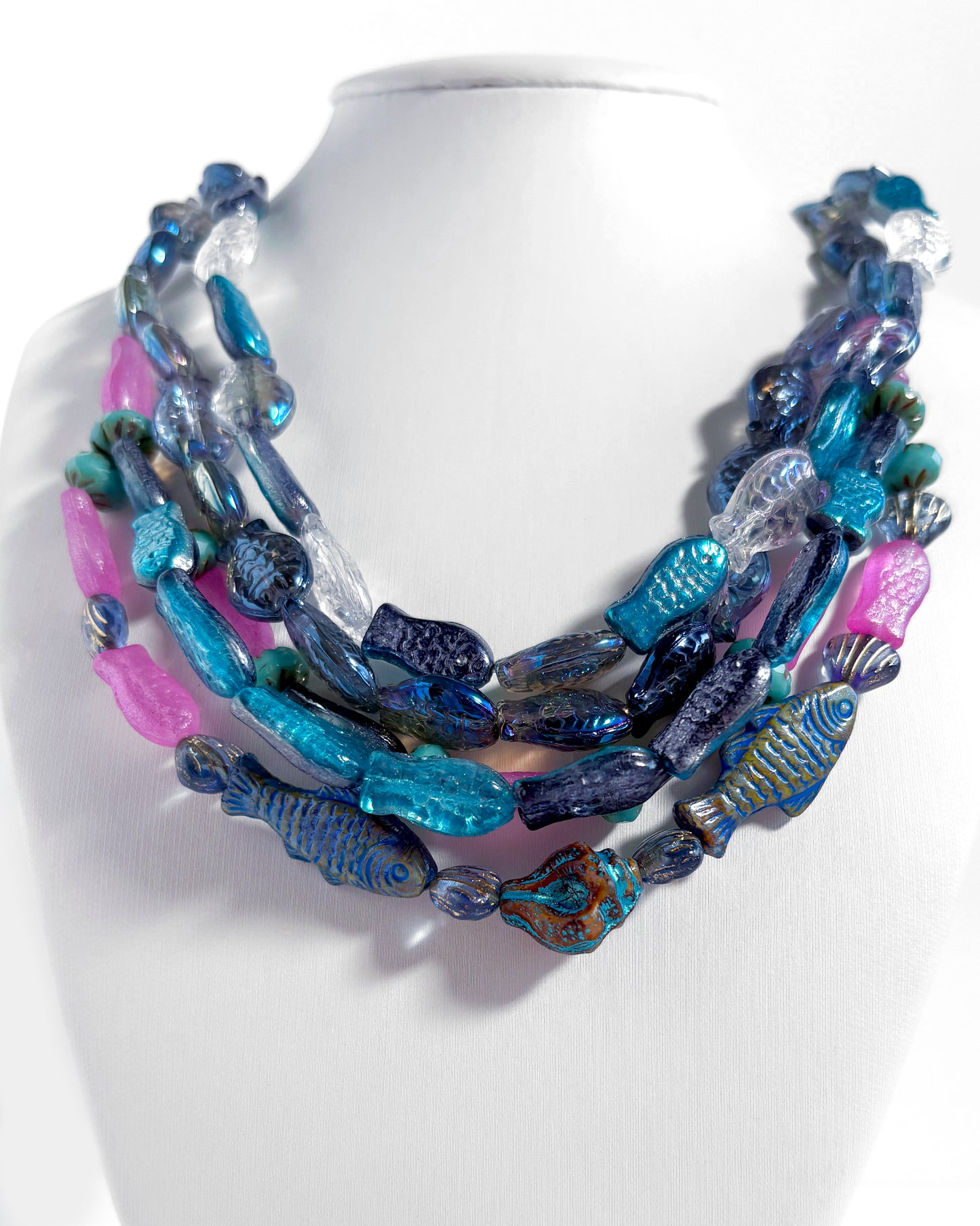 Marea necklace with blue and fuchsia boho fish crystals