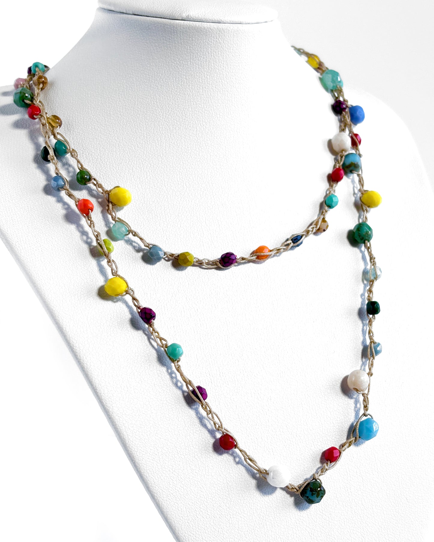 Long crochet necklace with small multicolored crystals
