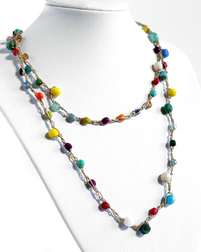 Long crochet necklace with small multicolored crystals