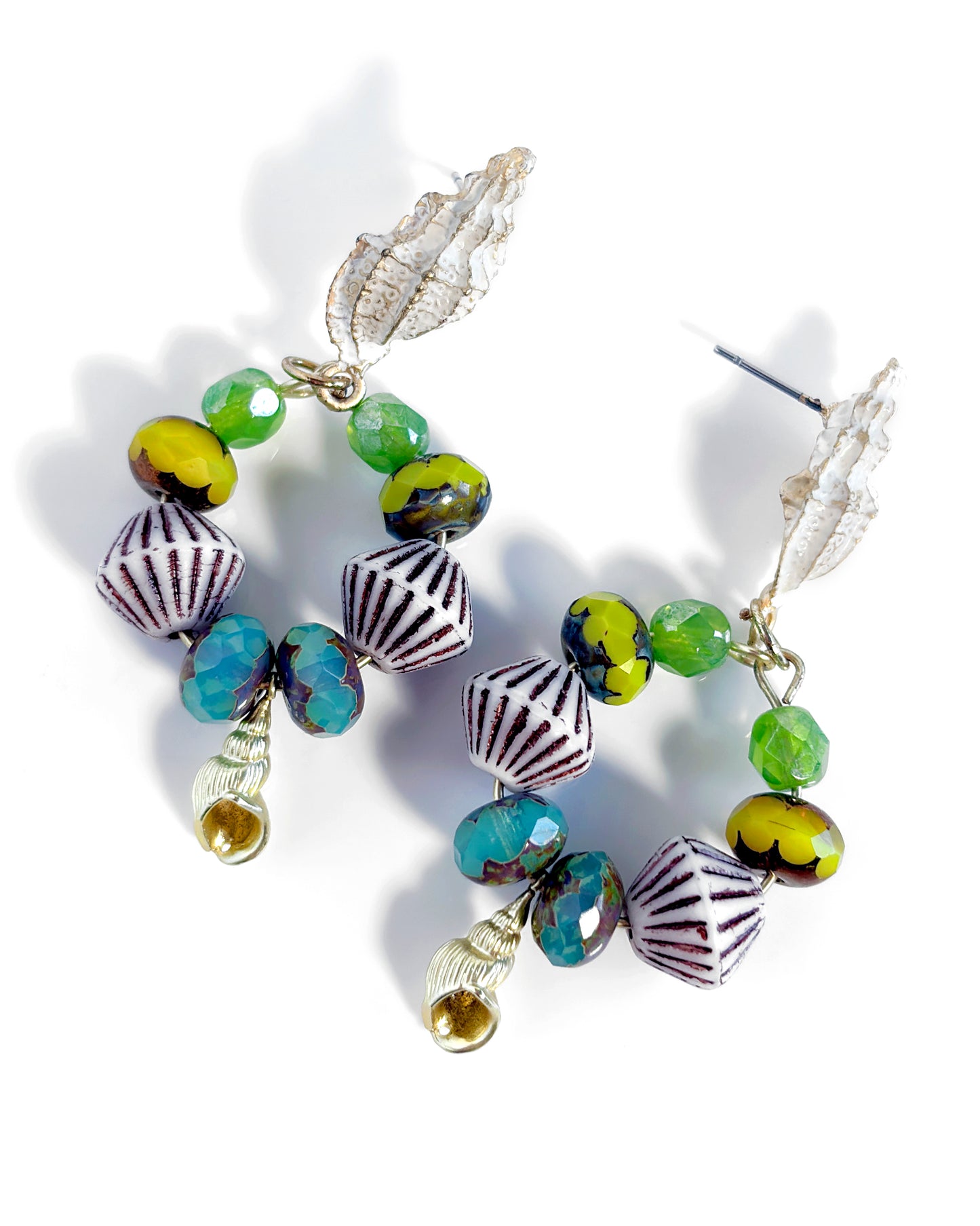 Hoop earrings with turquoise and lime crystals and shell clasp