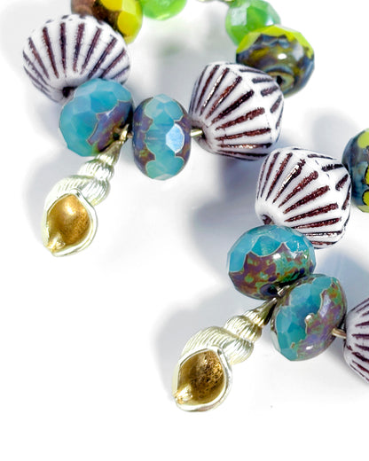 Hoop earrings with turquoise and lime crystals and shell clasp