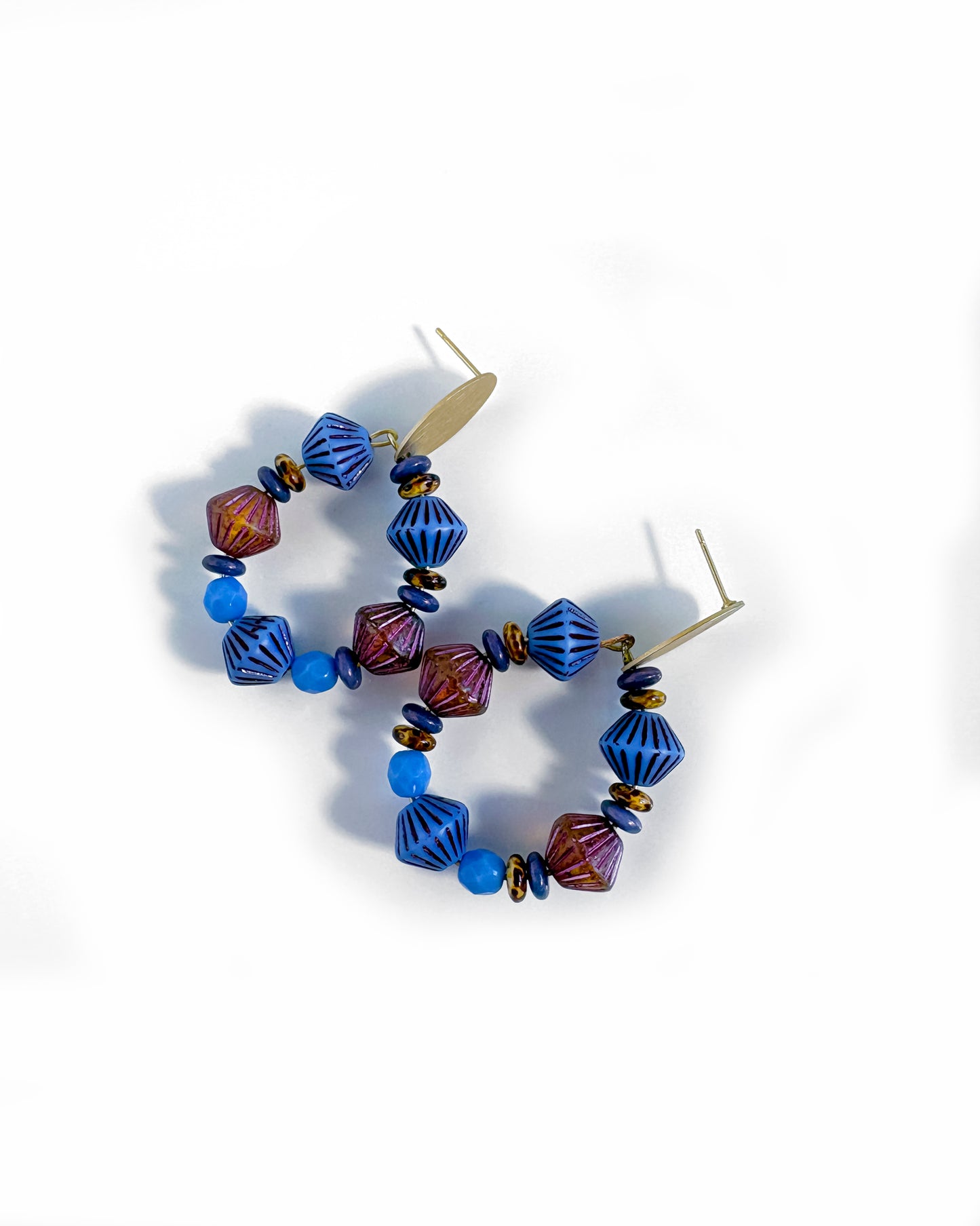 Hoop earrings with sky blue and purple Bohemian crystals